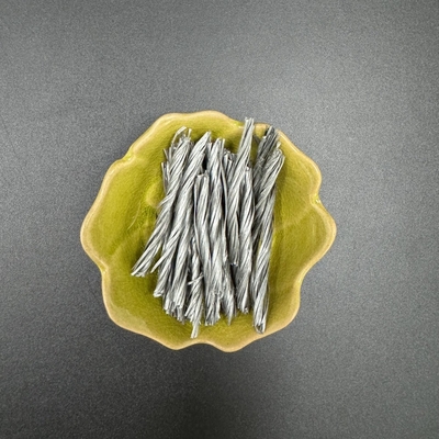 Forte capacité de combinaison de la fibre de PP en forme de grappes tordues pour une meilleure dispersion dans un mélange résistant aux fissures