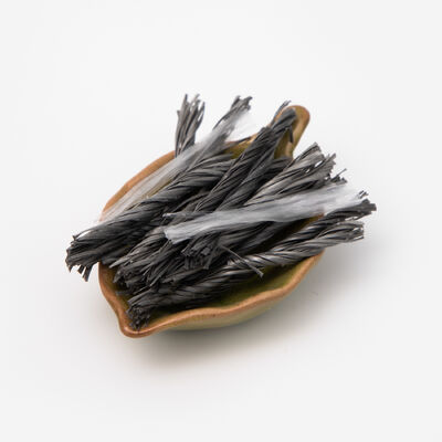 Au lieu des barres d'acier traditionnelles, les fibres hybrides de polypropylène pour la construction de ciment